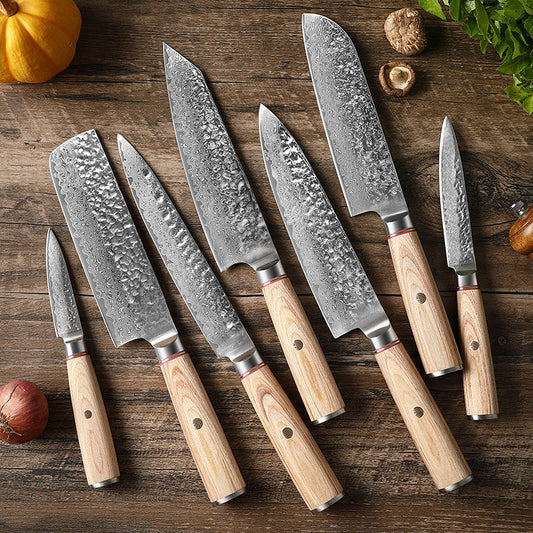 damascus steel japanese chef knife set on wood